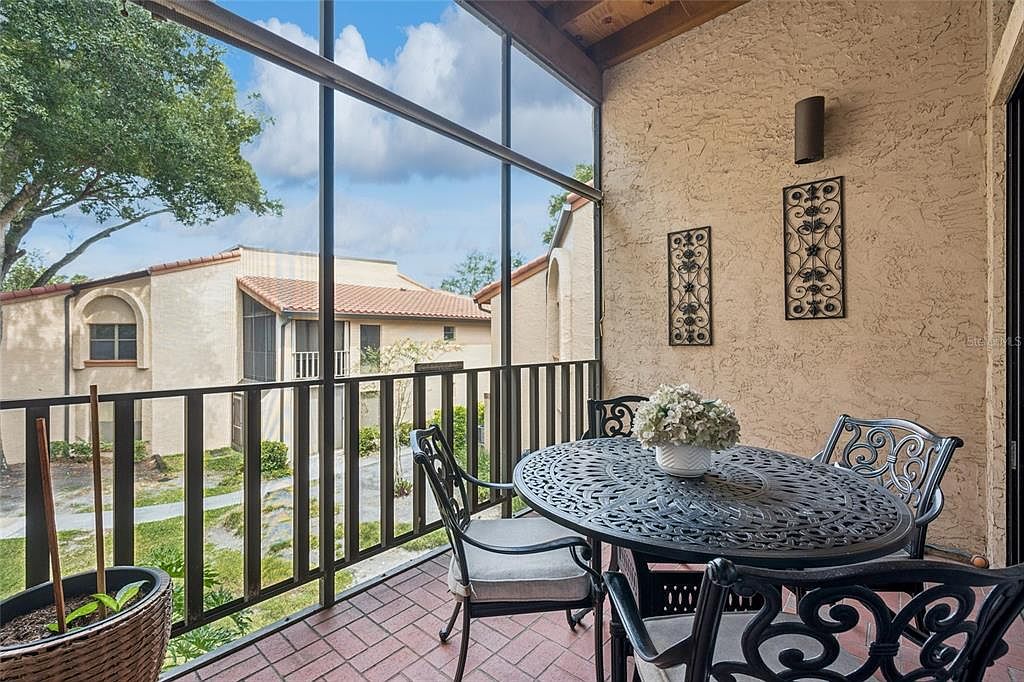 Screened, covered balcony